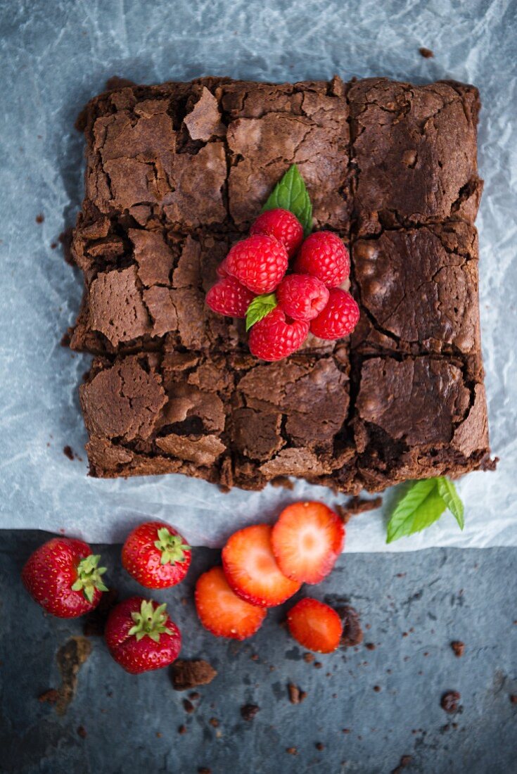 Brownies with fresh berries (seen from above)