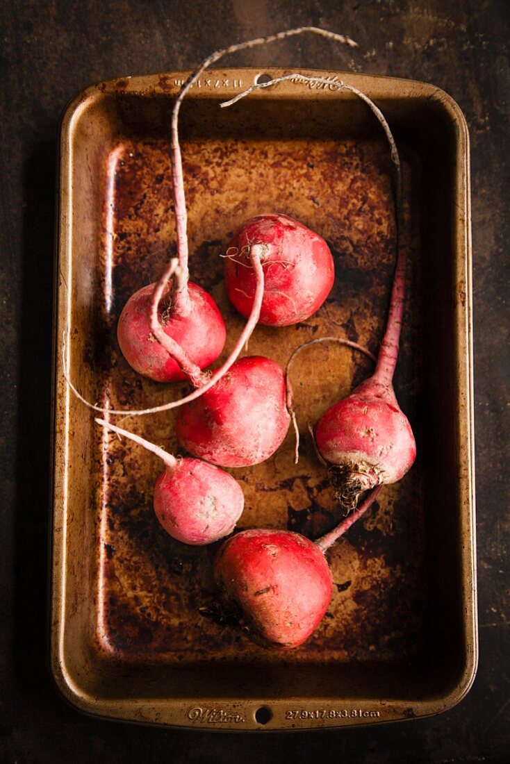 Red beet in an old baking tray