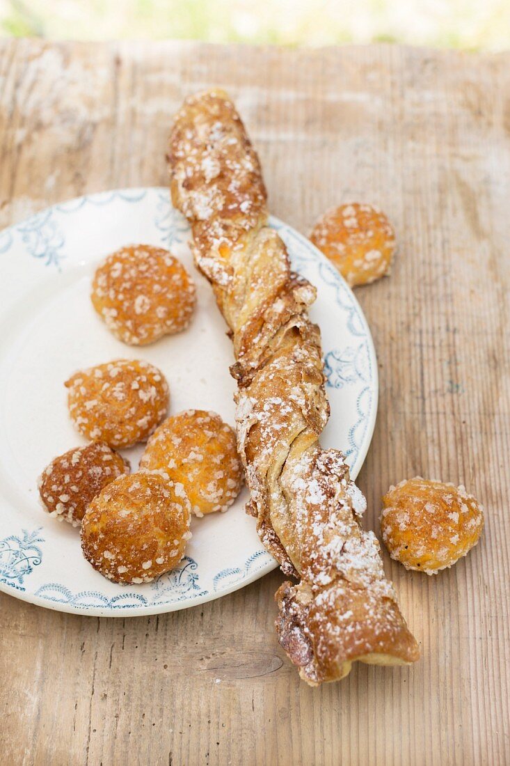 Chouquettes (profiteroles) and Sacristain (puff pastry stick filled with nuts), France