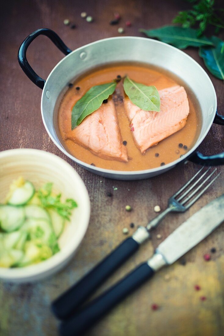 Poached rainbow trout with potato and cucumber salad