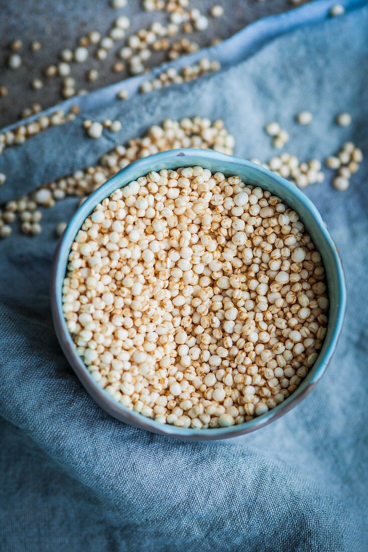 Puffed quinoa in a small dish (top view)