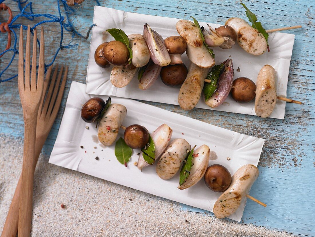 Sausage & mushrooms kebabs with bay leaves