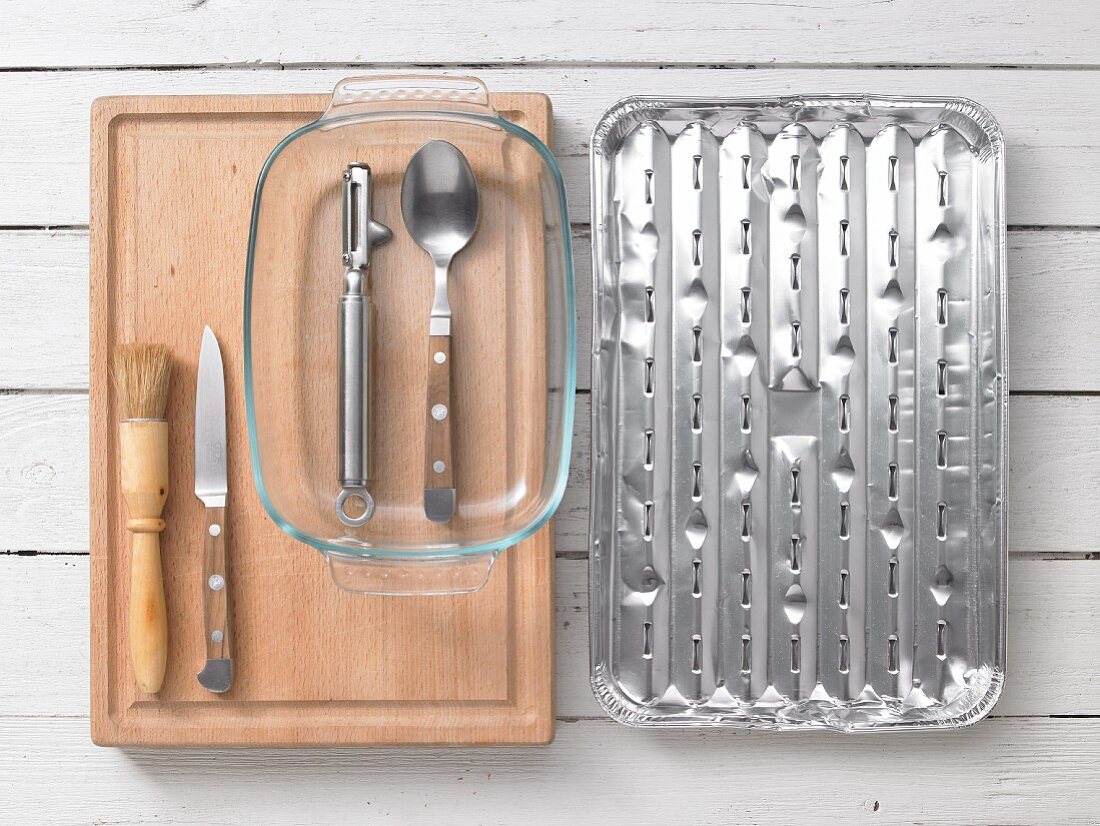 Kitchen utensils for preparing fish … – License Images – 11986877 ❘  StockFood