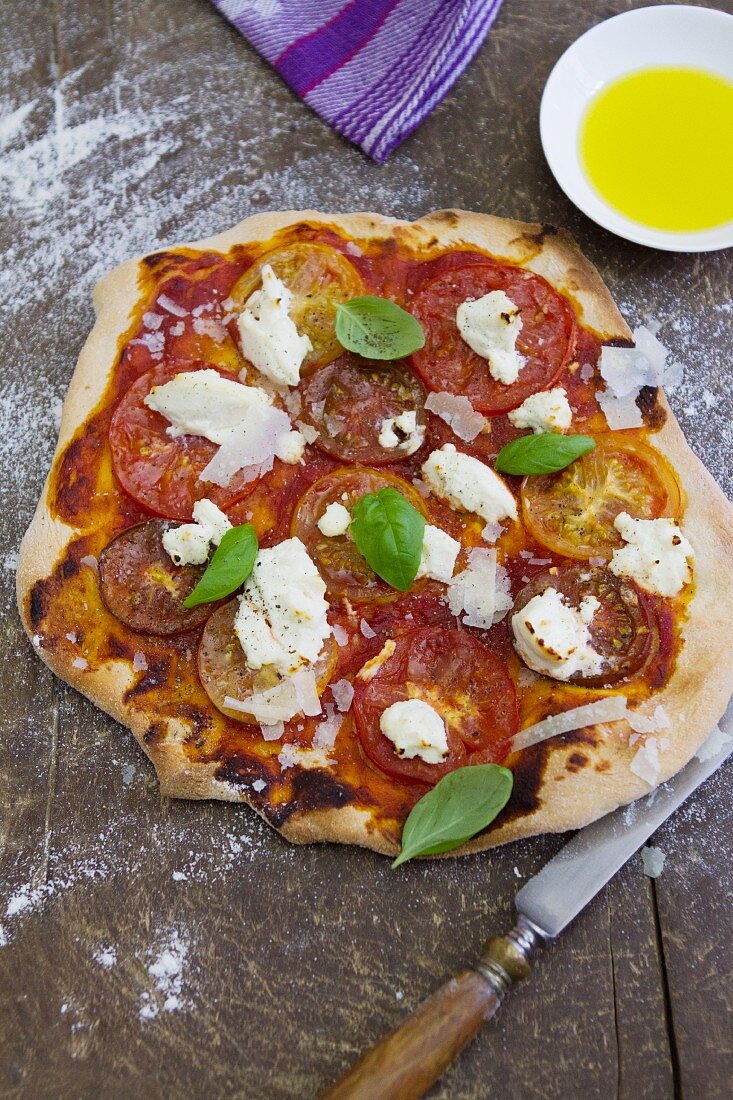 A tomato and ricotta pizza