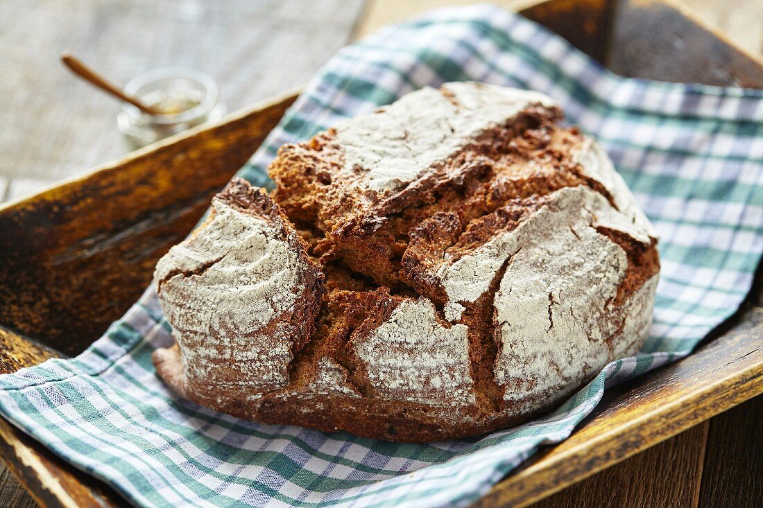 Rustic country bread on a checked napkin