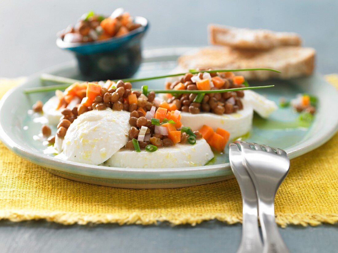 Lentil & carrot salad on slices of mozzarella