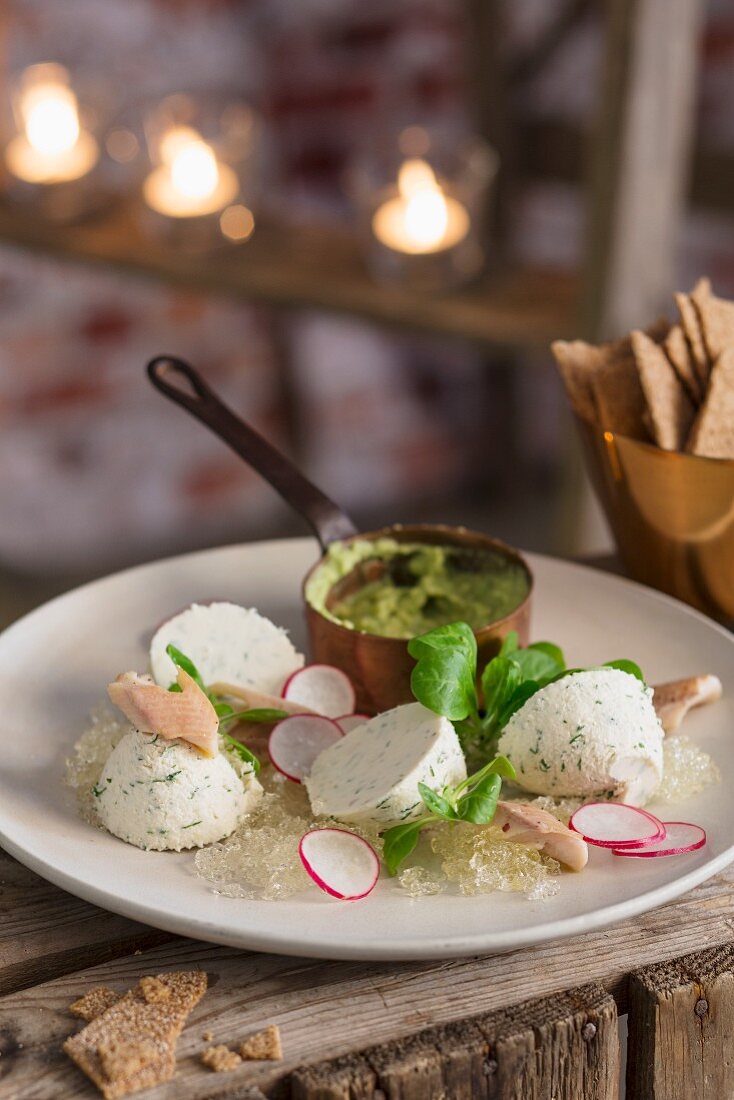 Trout mousse with radishes and avocado dip