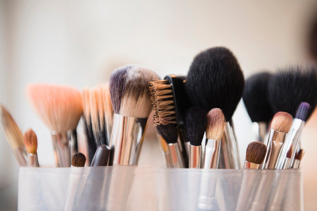 A close-up of assorted make-up brushes