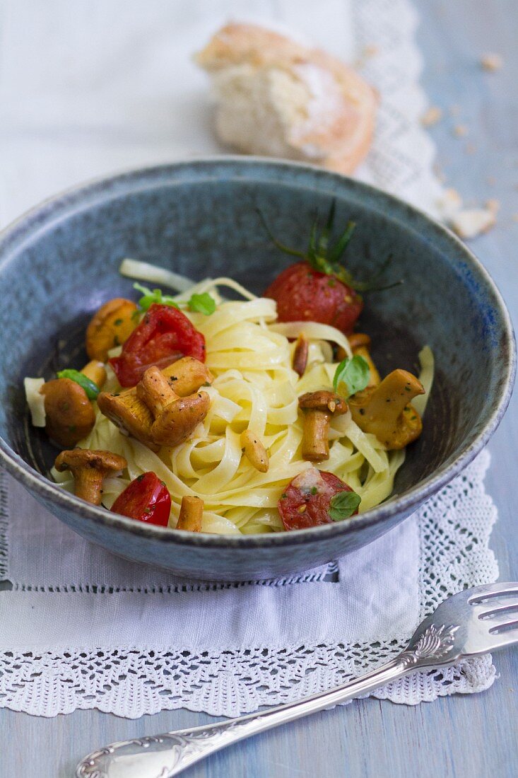 Tagliatelle with chanterelle mushrooms and cherry tomatoes