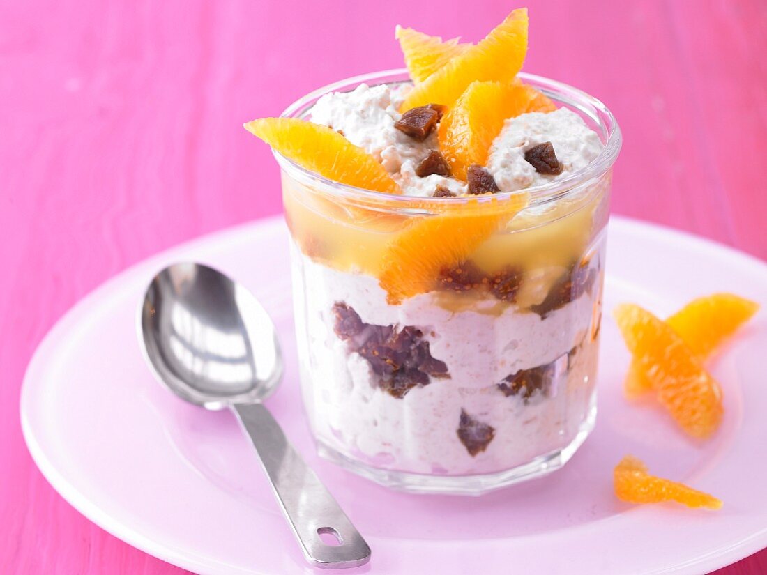 Fresh grain and fig muesli with soured milk and orange fillets