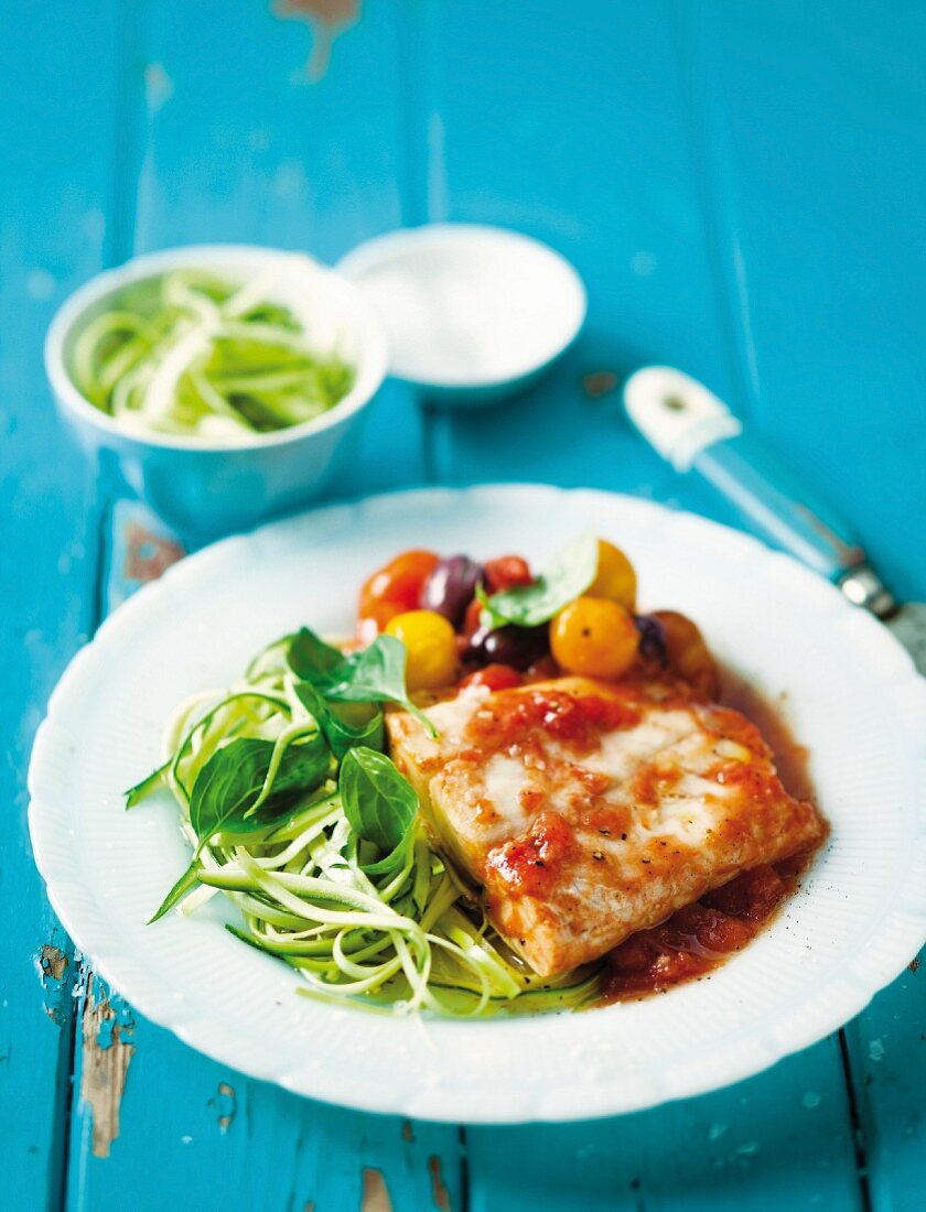 Fish fillet with tomato & olive sauce and courgette spaghetti
