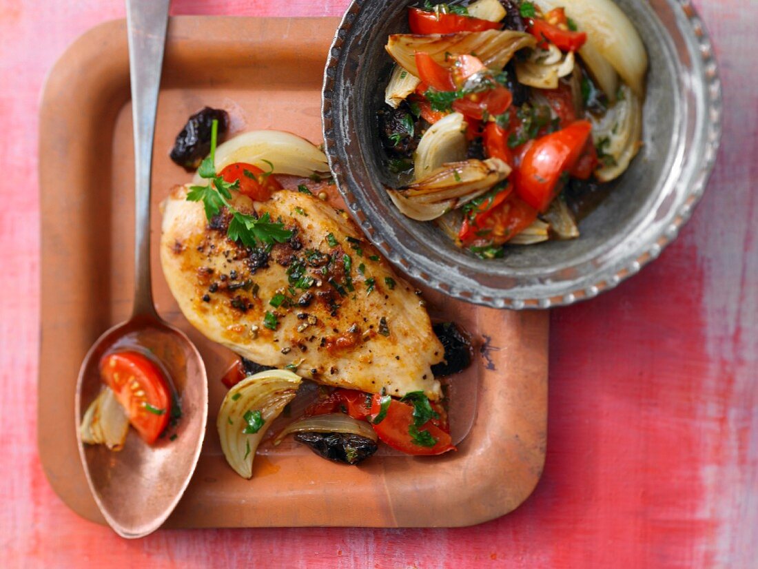 Chicken breast with vegetables and plums