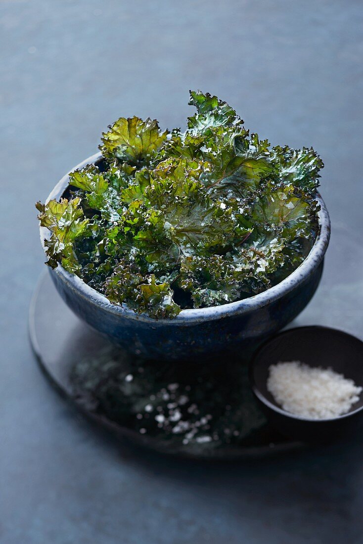 Kale crisps with sea salt in a bowl