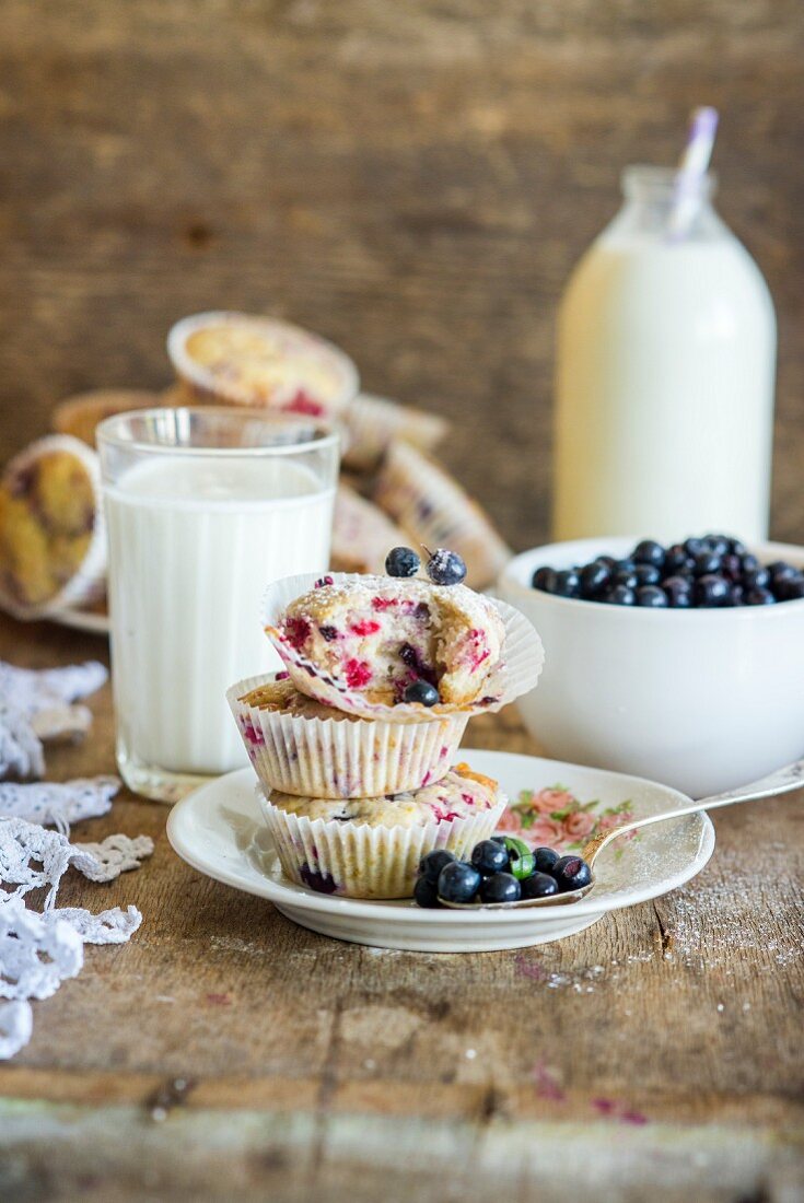 Stacked cupcakes with raspberries, blueberries and white chocolate