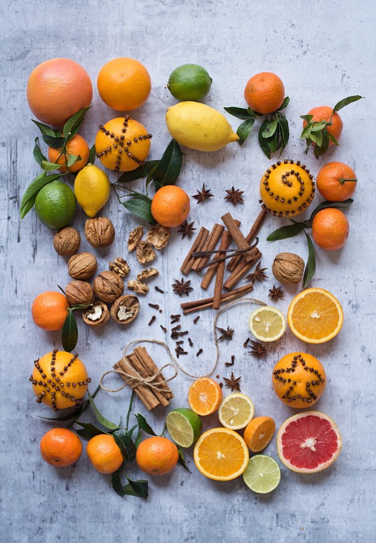Assorted citrus fruits with nuts and spices