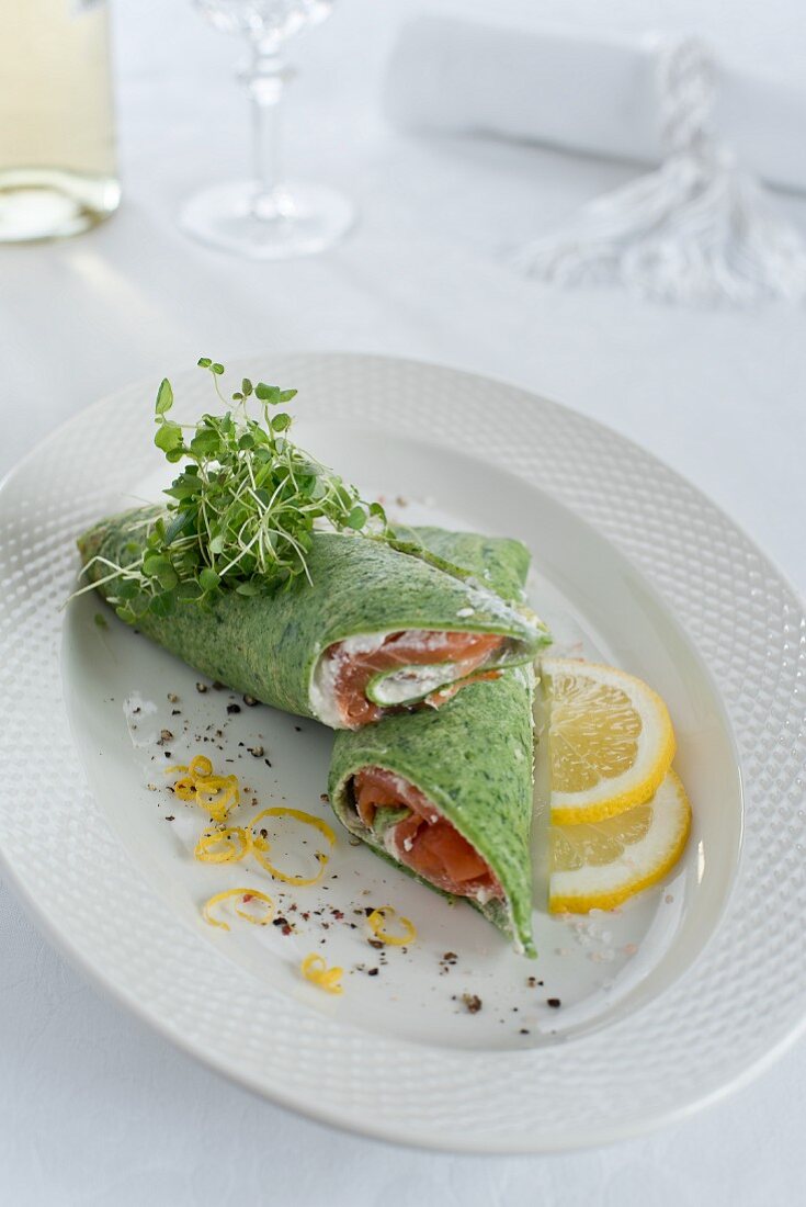 Spinach pancakes with smoked salmon and fresh cheese