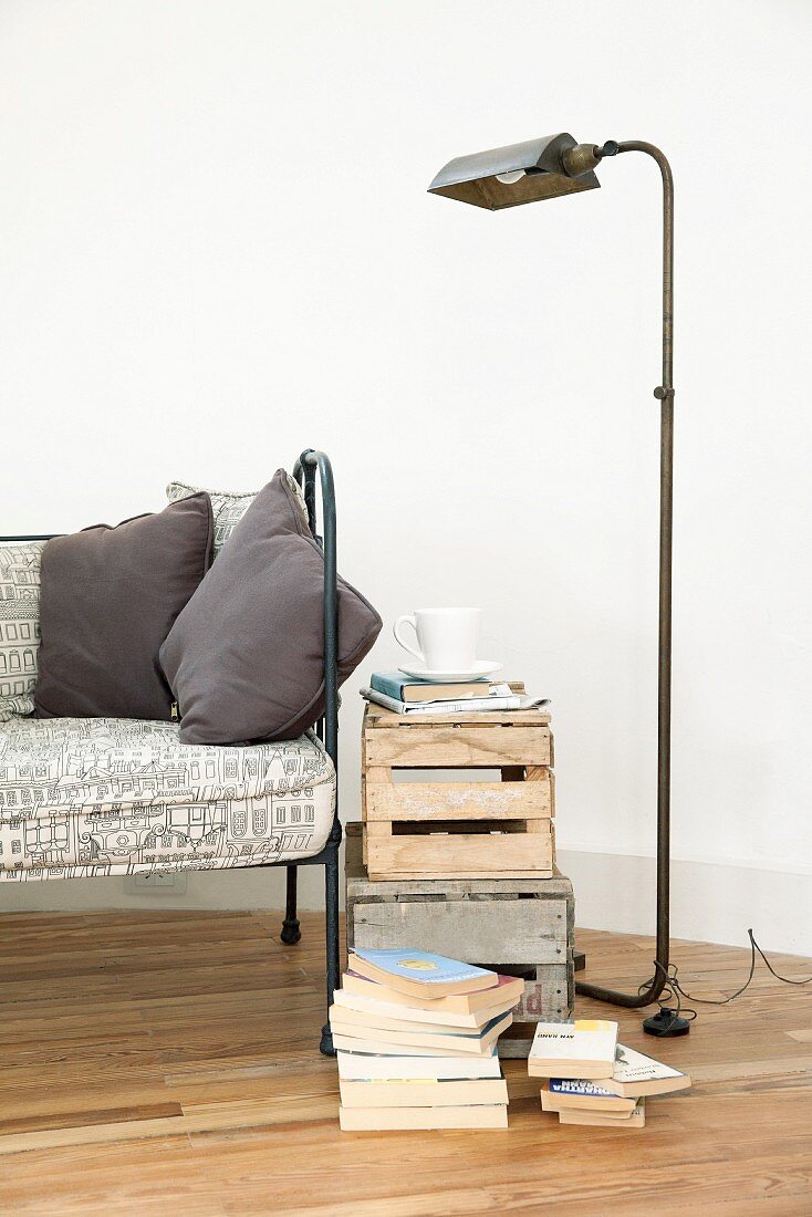 Wooden crates used as side table next to couch