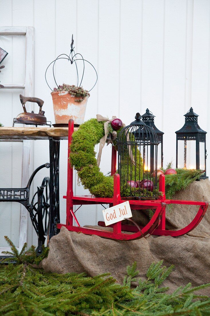 Festively decorated veranda outside wooden house