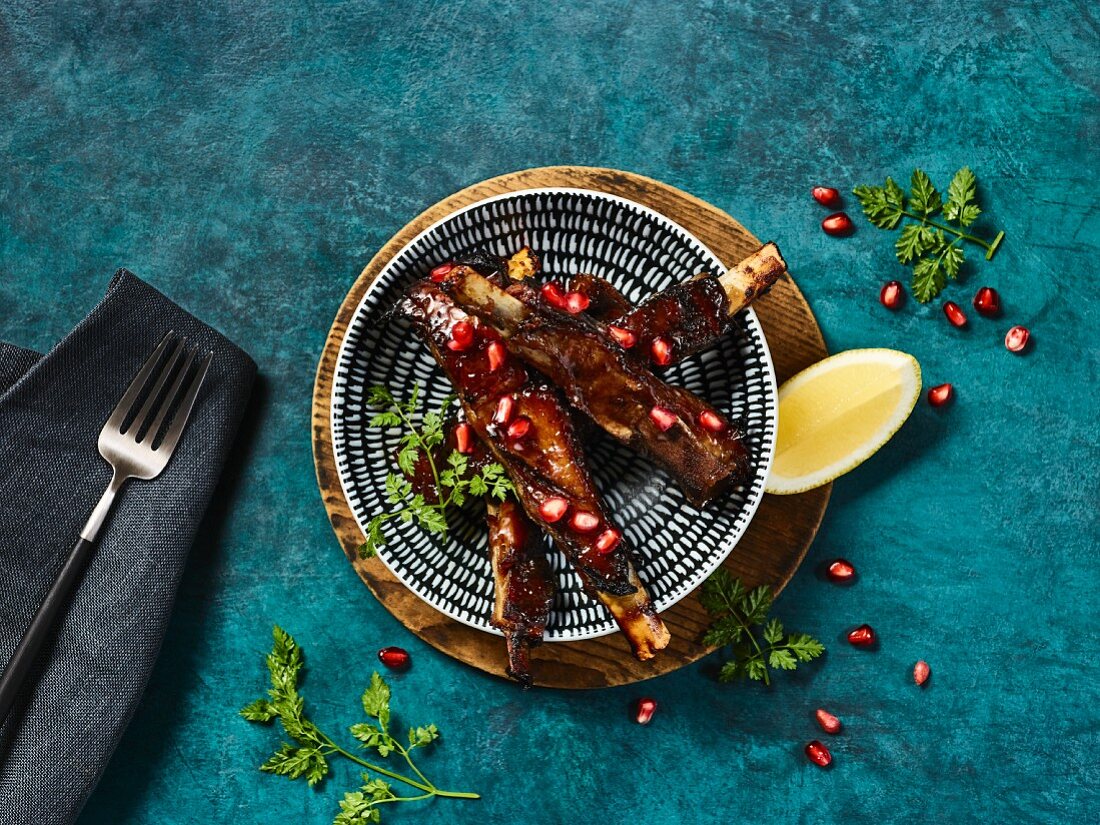 Lamb ribs with pomegranate seeds