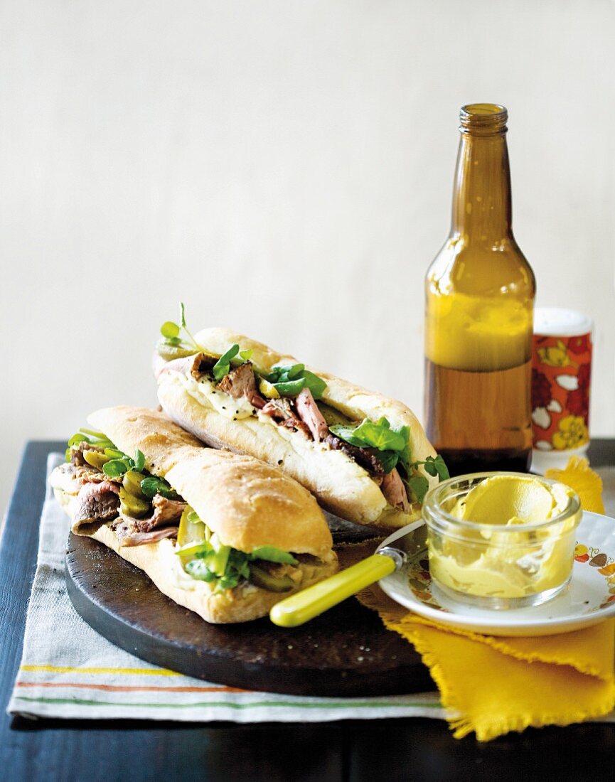 Ciabatta sandwiches with beef, gherkins and watercress