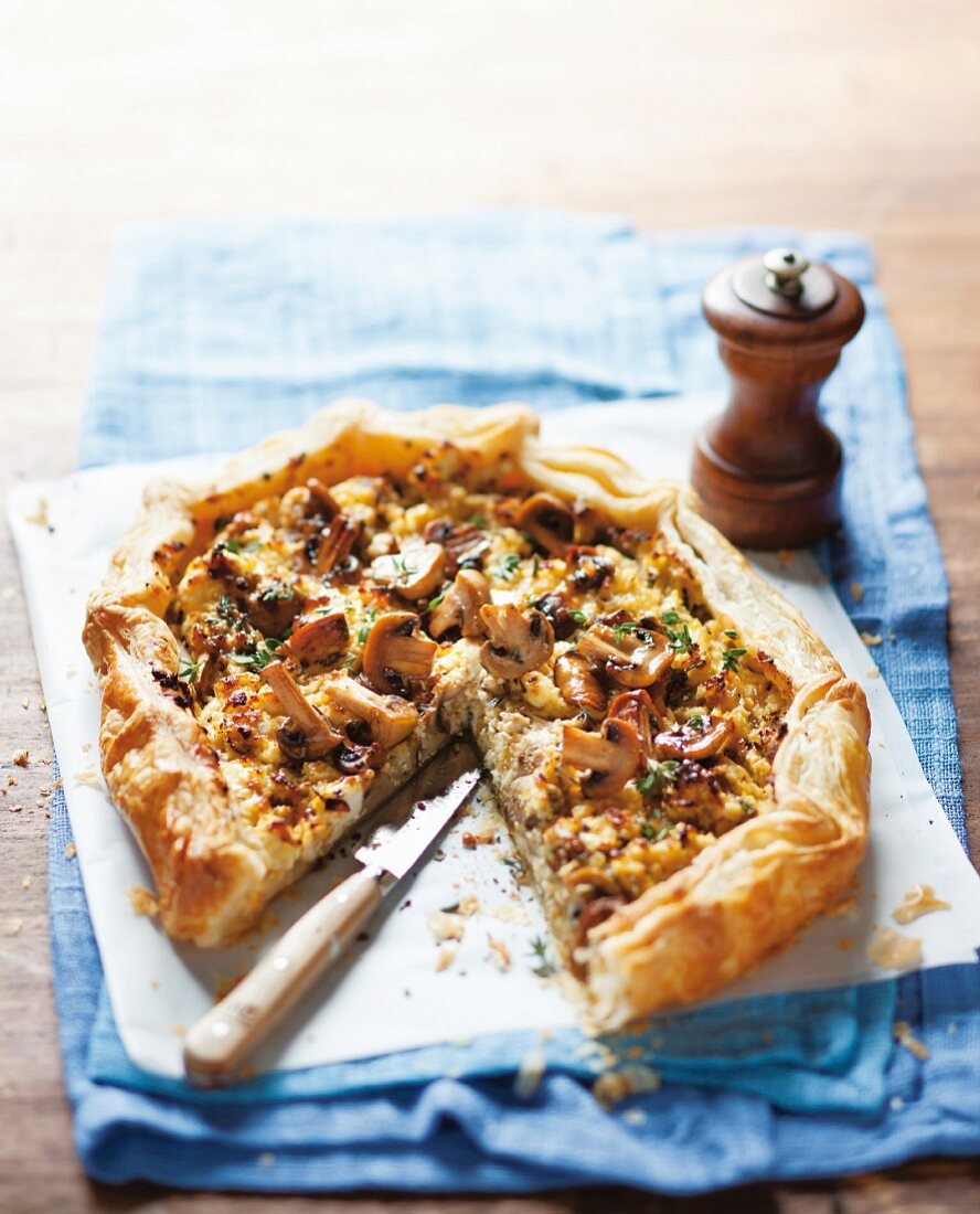 A puff pastry tart with mushrooms and ricotta
