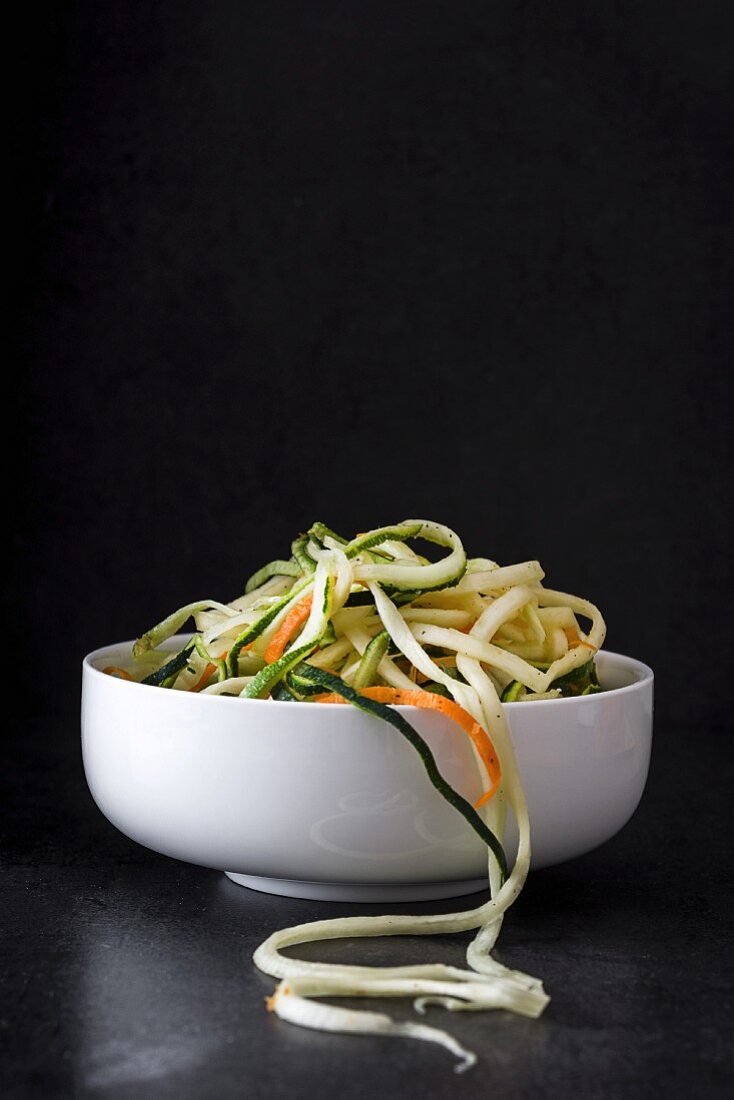 Carrot and courgette noodles in a bowl