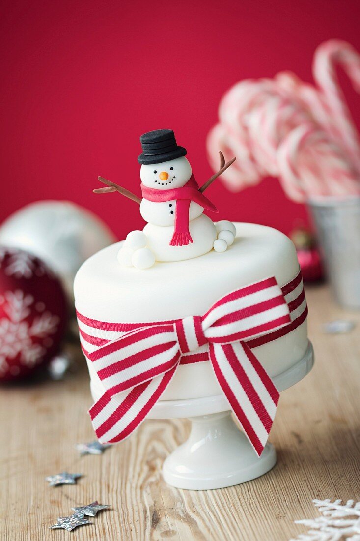 Christmas cake decorated with fondant snowman