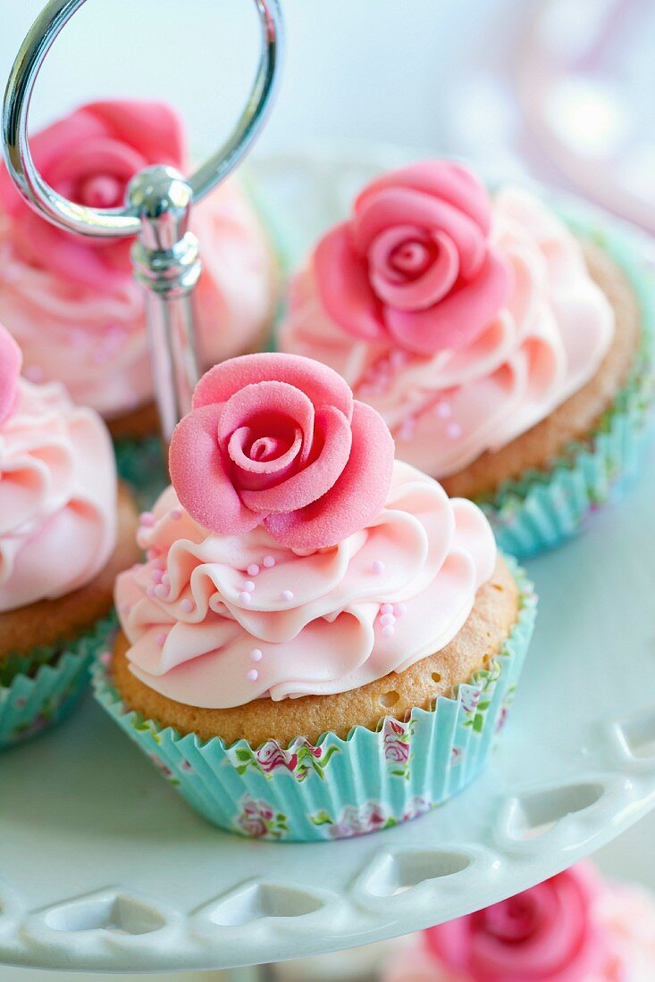 Cupcakes decorated with sugar roses