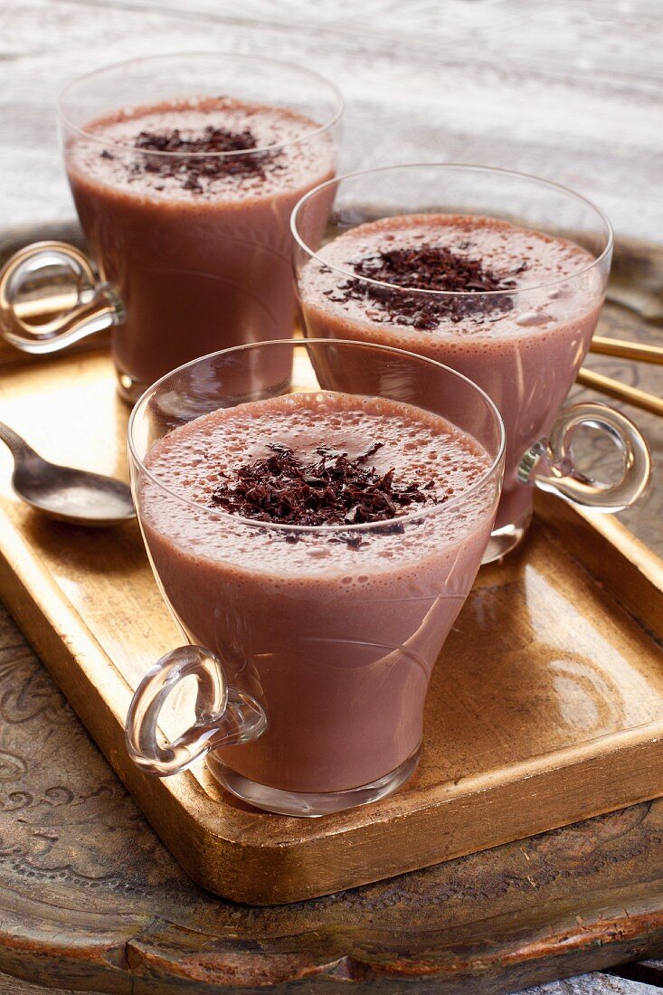 A cocoa drink with grated chocolate