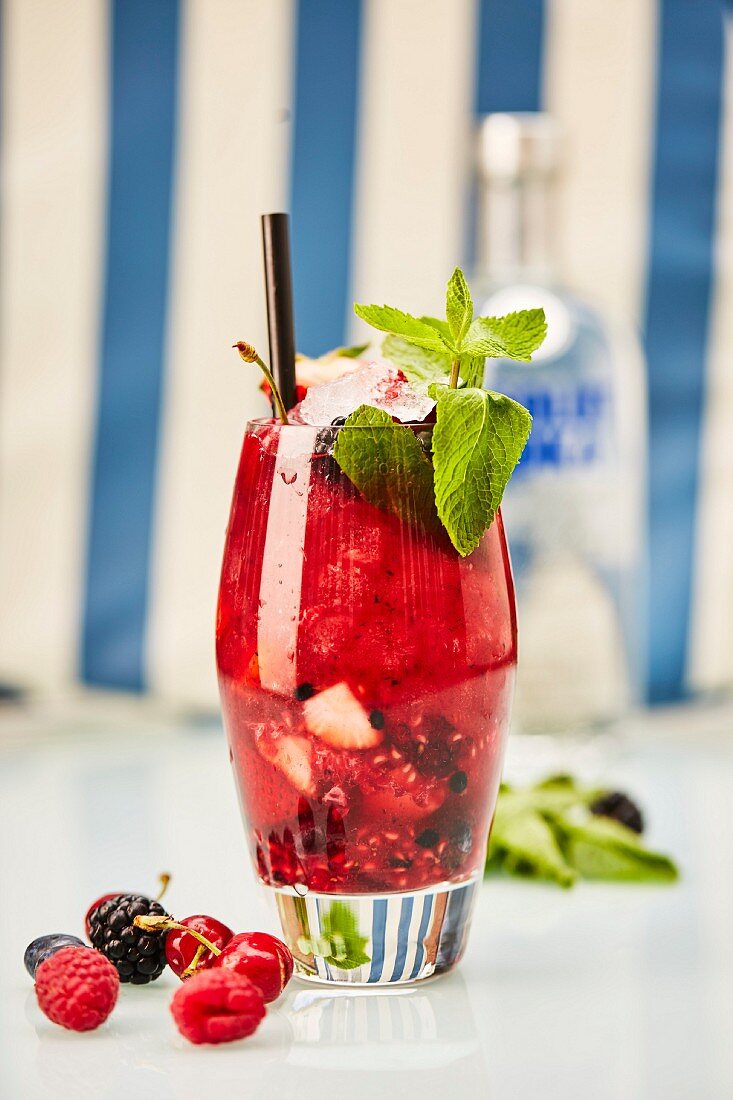 Summer cocktail with fresh berries
