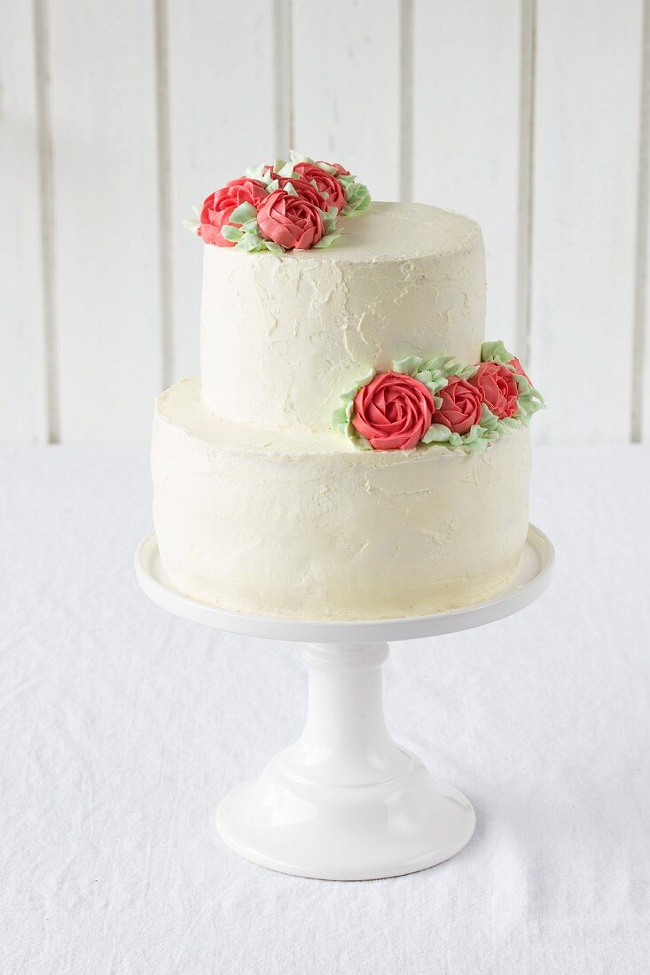 A wedding cake with buttercream roses