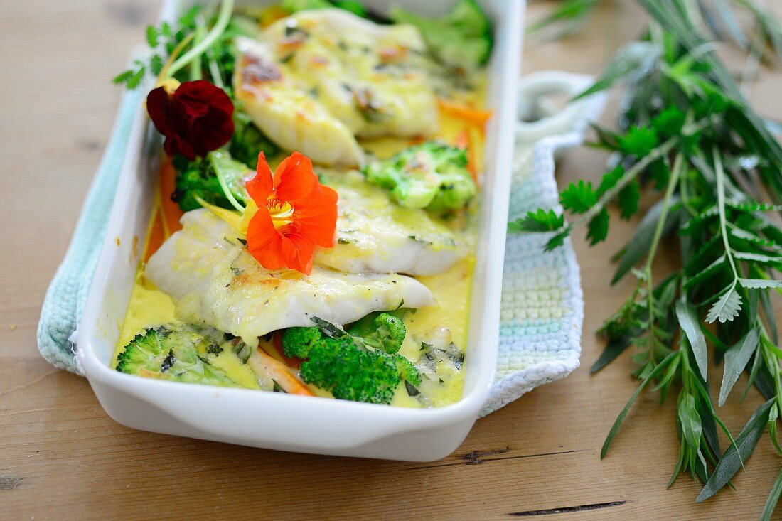 Herb-coated fish with vegetables