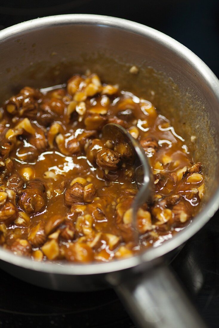 Caramelized nuts in a saucepan