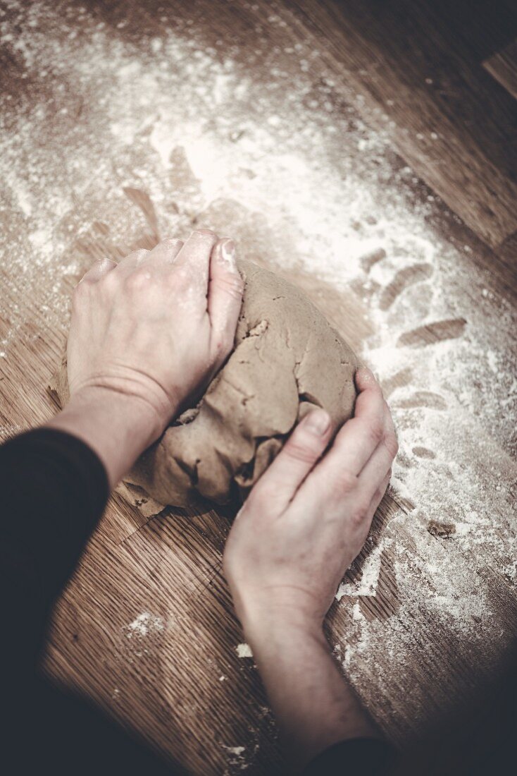 Gingerbread dough being kneaded
