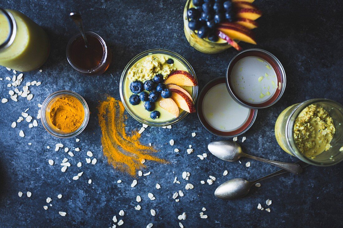 Golden milk with porridge oats and fresh fruits (gluten-free)