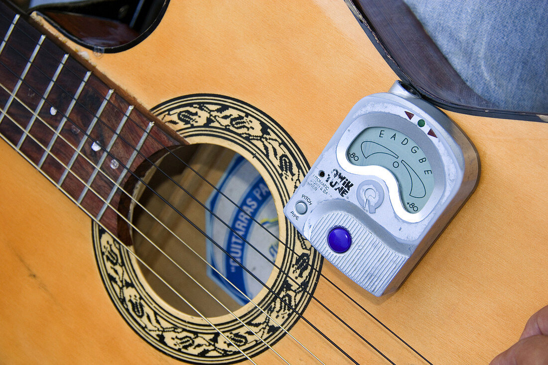 Electric Tuner on Acoustic Guitar