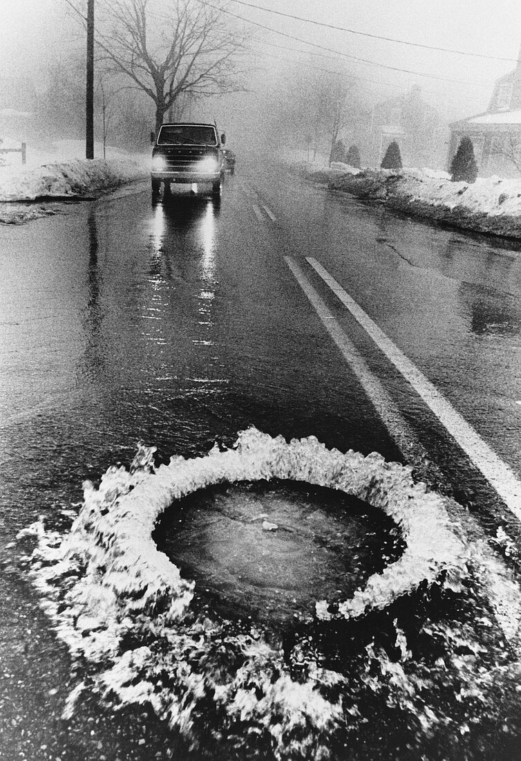 Pothole in the Rain