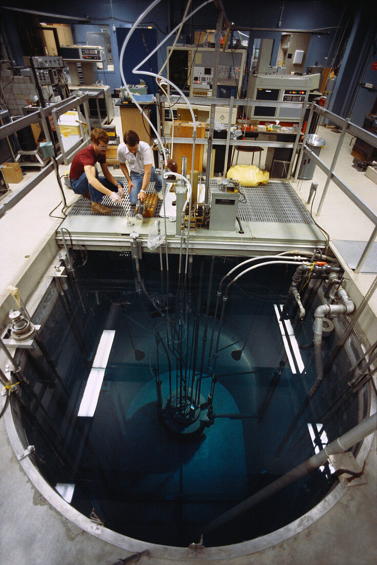 Graduate students at nuclear reactor