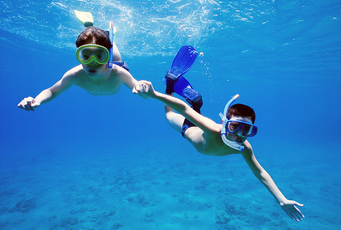 Boys snorkelling,Red Sea
