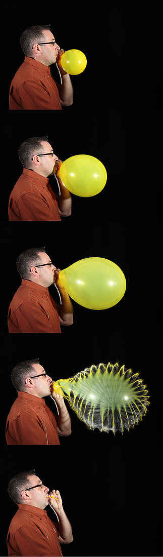 Man bursting a balloon