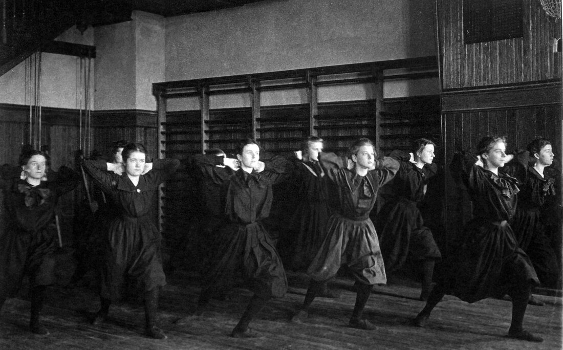 Girls in Bloomers Exercising,1899
