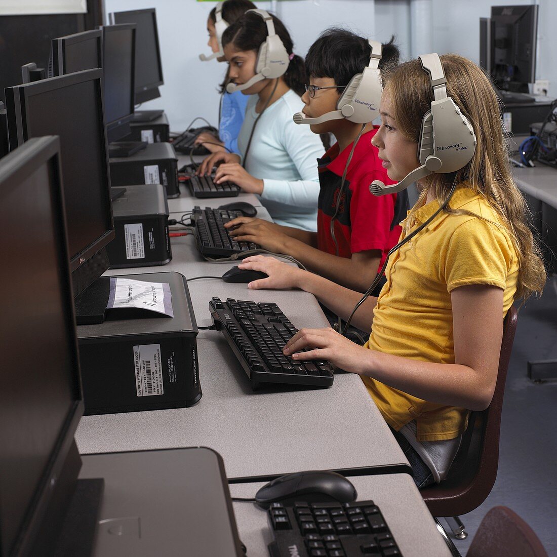 5th Grade Children Working with Computers