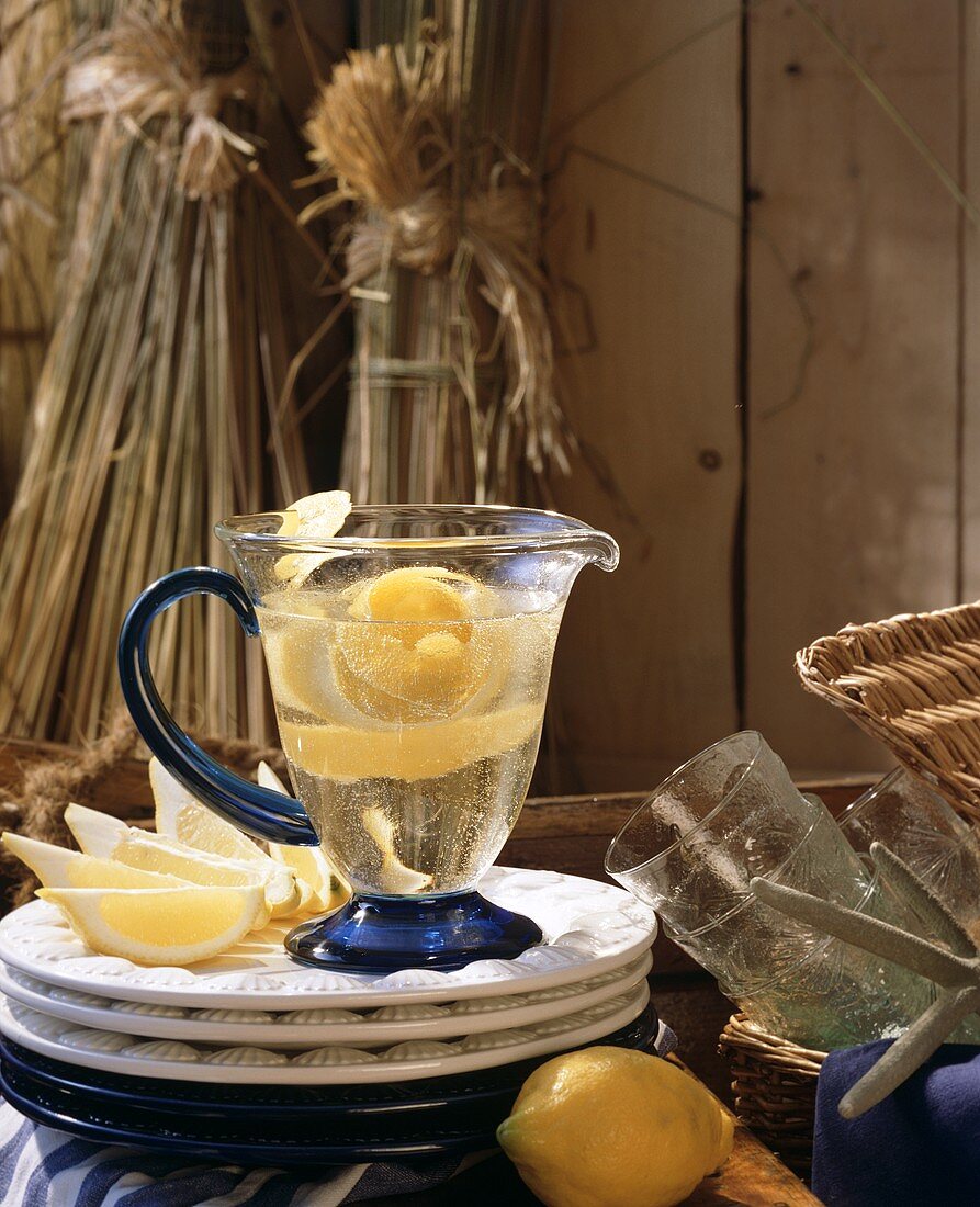 Lemon fruit punch in a Glass Pitcher with Lemon Slices