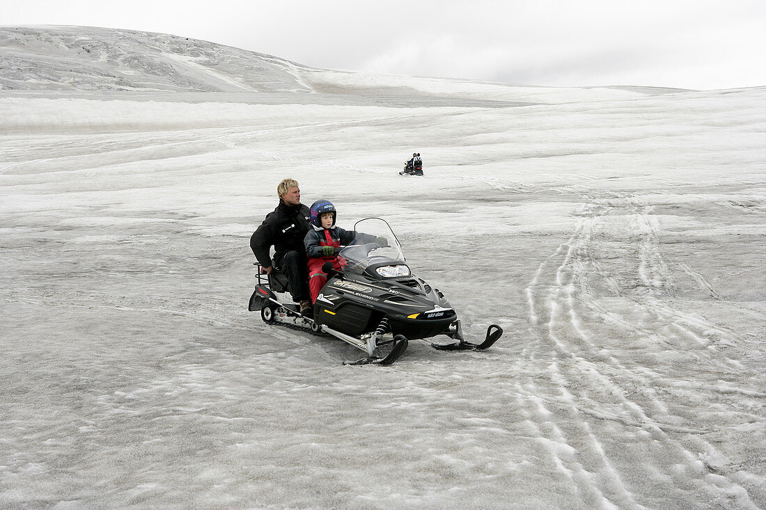 Snowmobiling on a glacier,Iceland