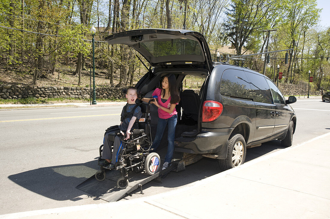 Girl with Wheelchair-bound Friend