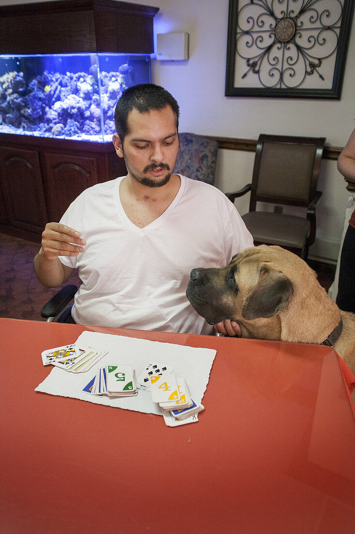 Patient at Rehabilitation Clinic with Dog
