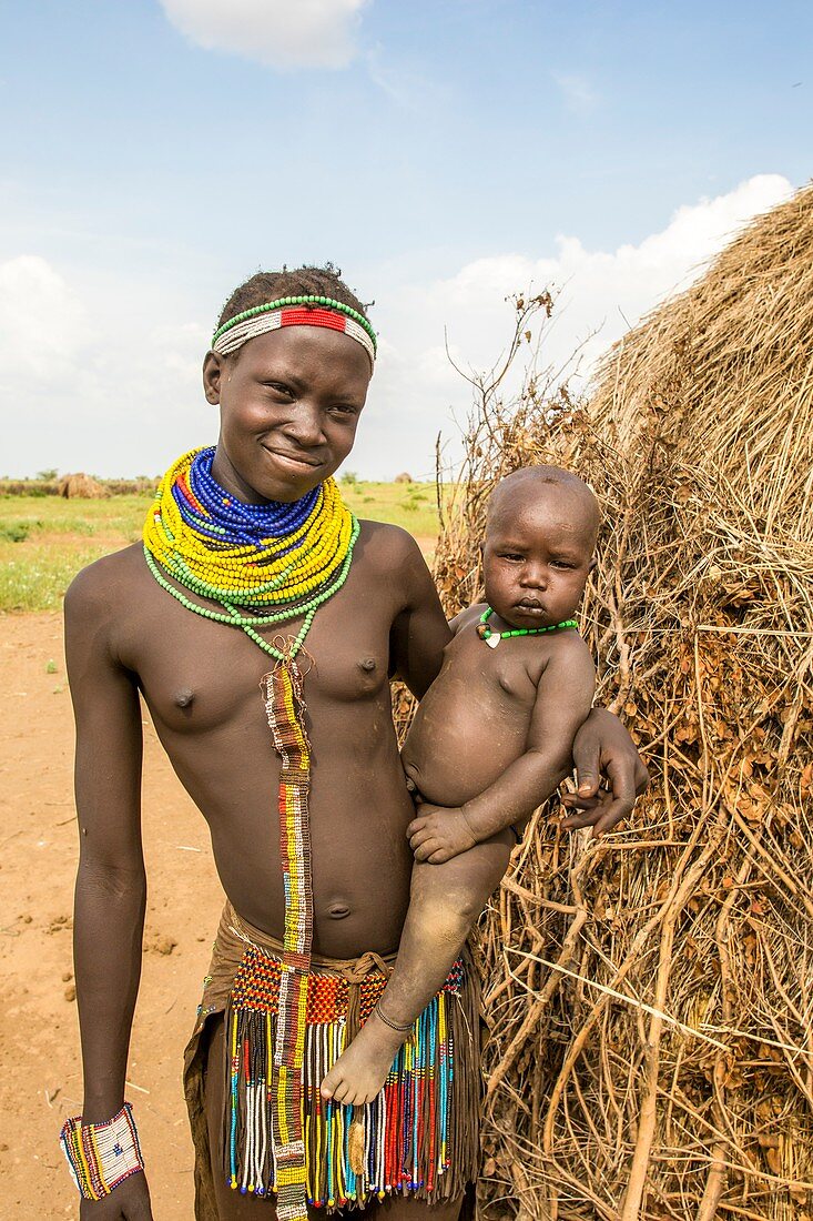 Nyangatom woman with baby in arms