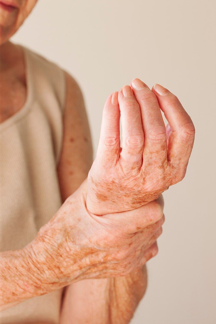 Elderly woman with wrist pain