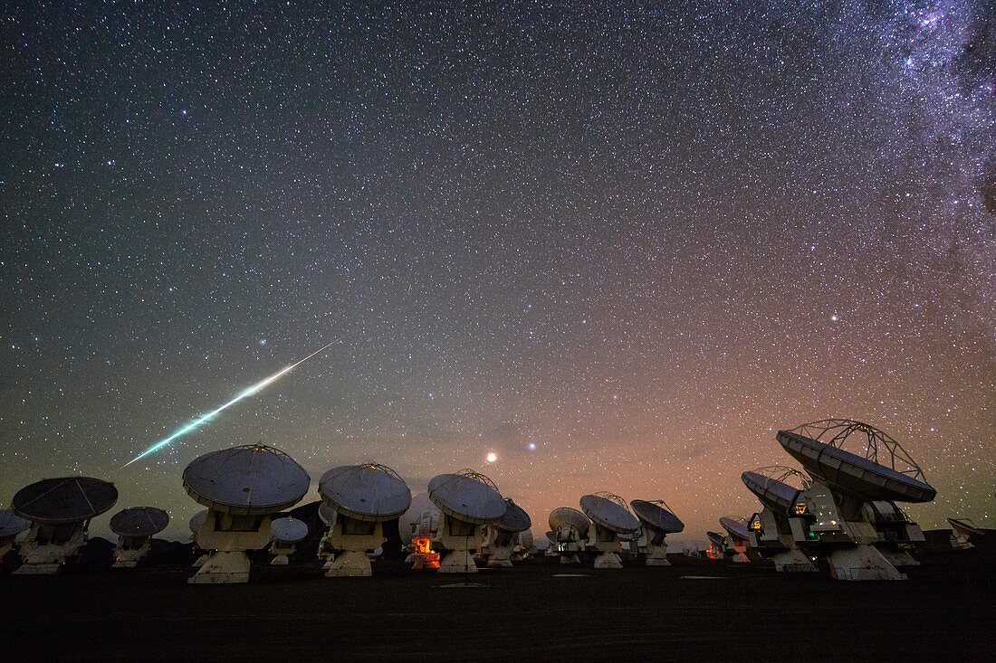 Meteor over ALMA telescopes