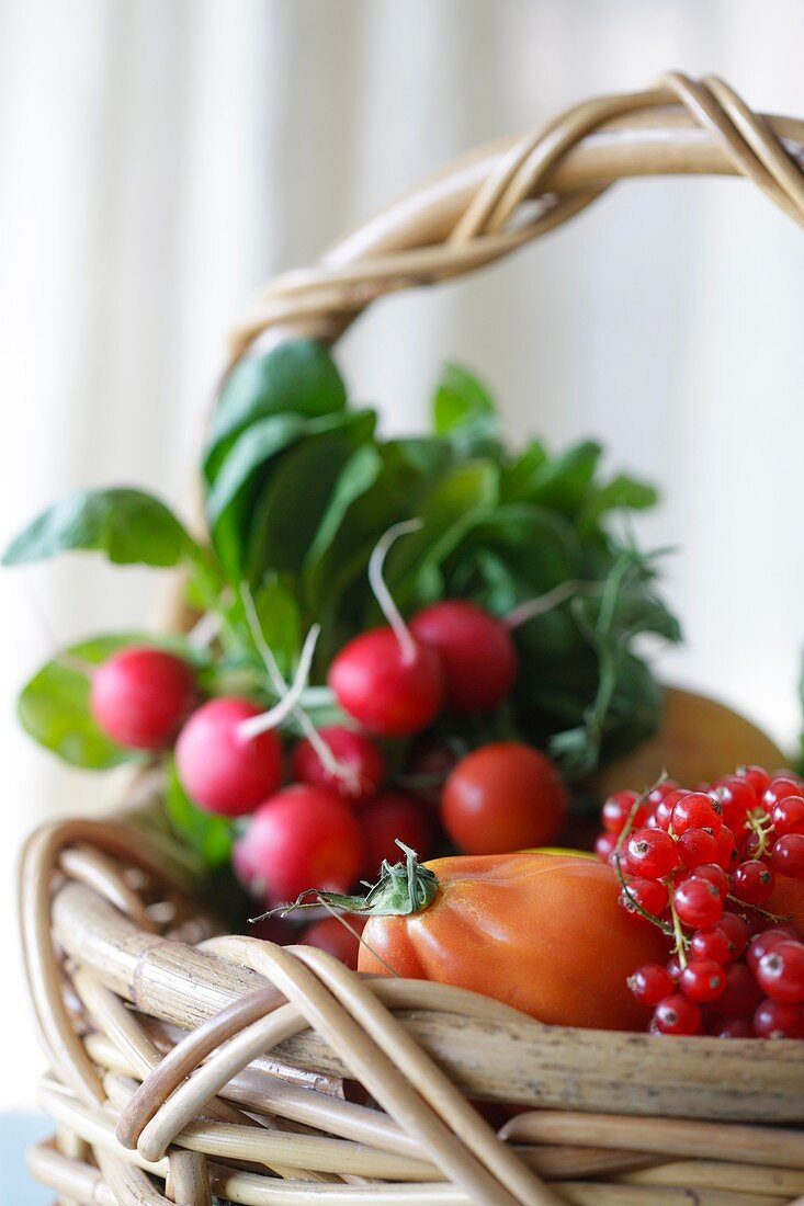 Fresh fruit and vegetables in a basket